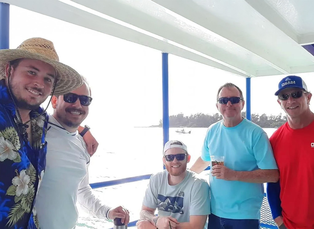 Father's and sons on a boat